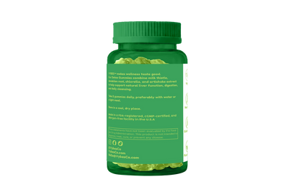 Green supplement bottle with capsules on a white background